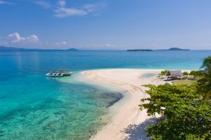 Tropical island with a white beach. Mahaba Island, Philippines.