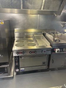New commercial marine cooktop oven in Coral Discoverer's galley