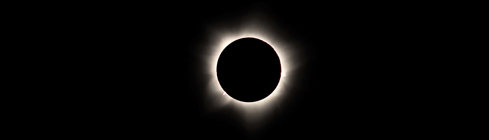 Solar Eclipse image by Luke Logens banner png